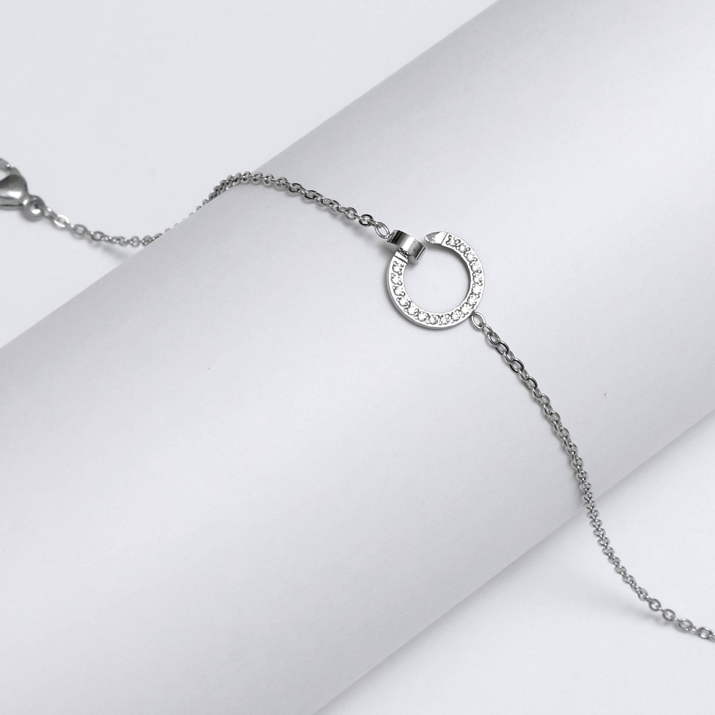 Silver Korean style circle bracelet with delicate chain and small circular pendant by Glimii