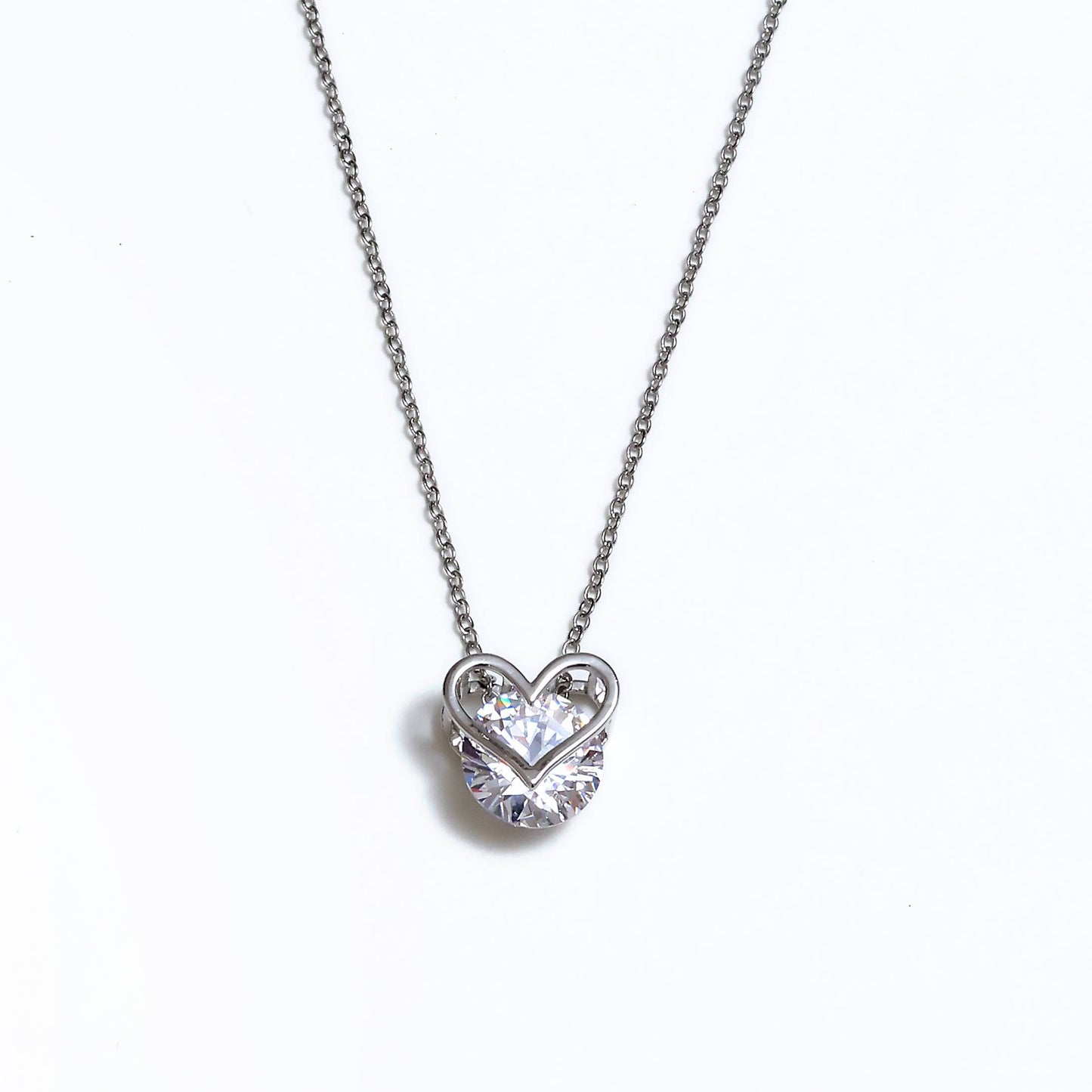 Glimii minimalist heart necklace with silver chain and sparkling clear heart-shaped pendant