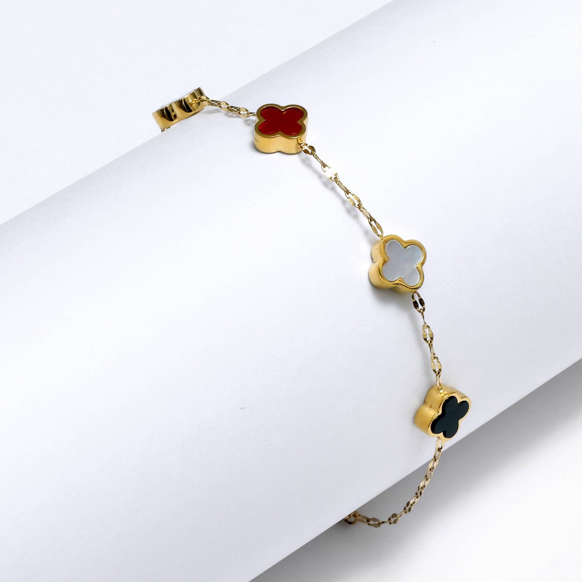 Glimii gold chain clover charm bracelet with red white and black enamel four-leaf charms