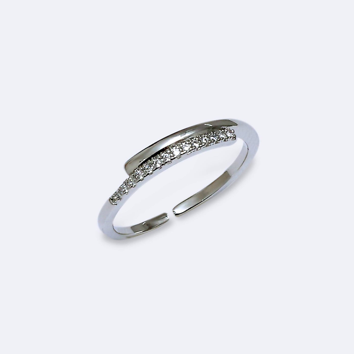 Glimii adjustable O statement ring with silver band and sparkling stones on white background