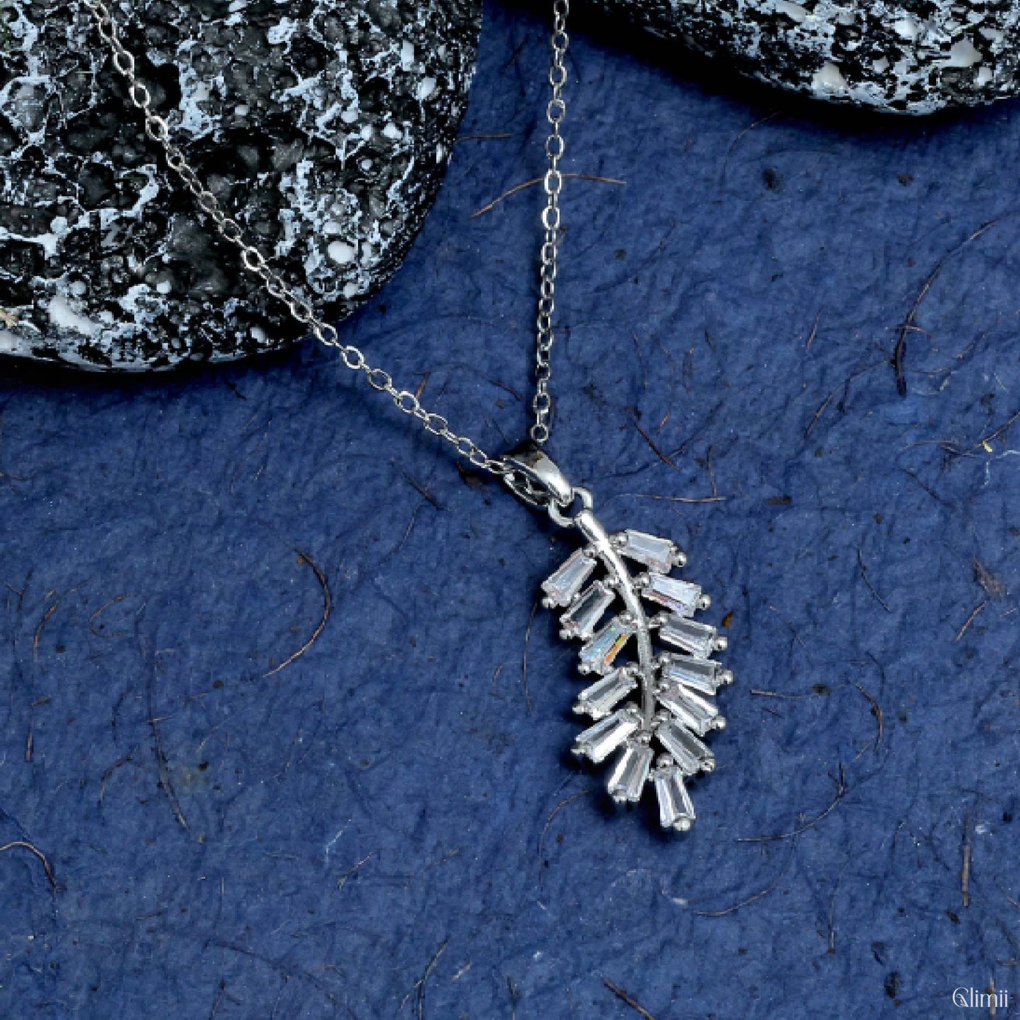 Glimii stainless steel dainty necklace with a leaf-shaped crystal pendant on a delicate chain