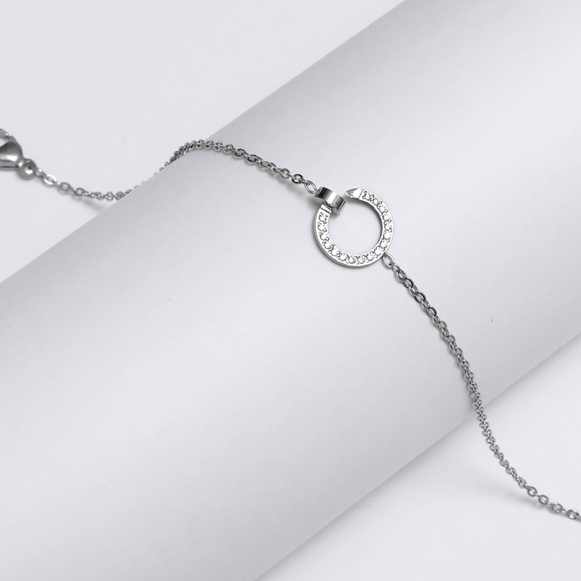 Silver Korean style circle bracelet with delicate chain and small circular pendant by Glimii