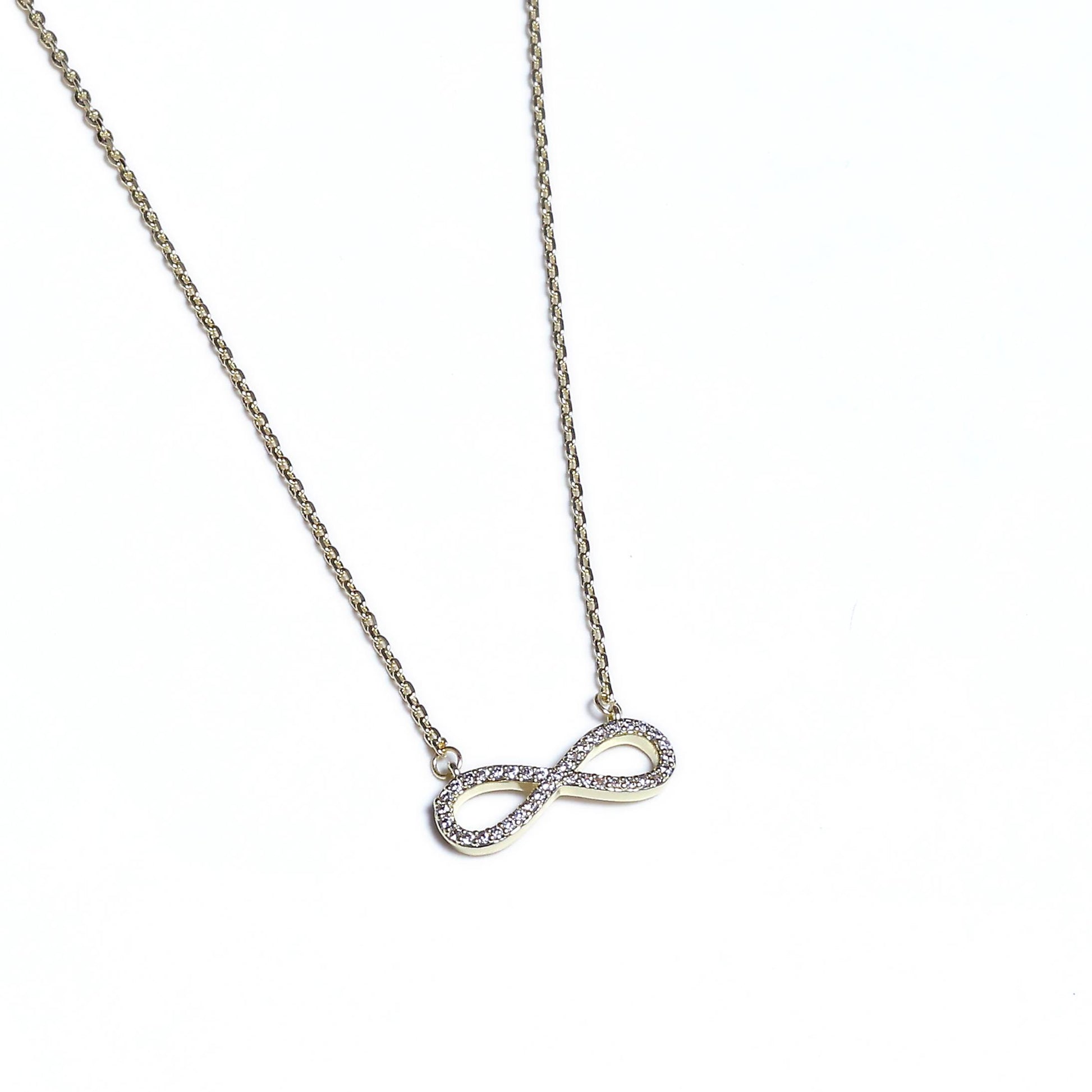 Glimii dainty infinity pendant necklace with silver chain and crystal accents on white background