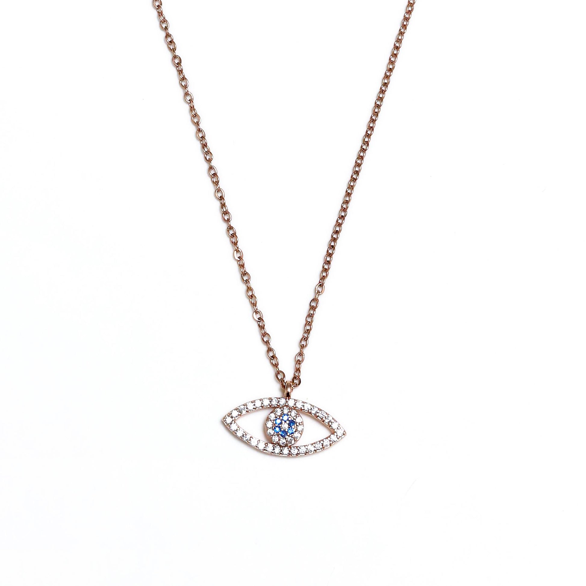 Glimii delicate evil eye necklace with blue and clear stones on a rose gold chain