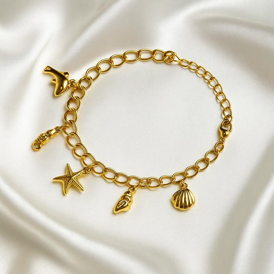 Glimii gold-tone chain bracelet with dolphin starfish shell charms stainless steel beach jewelry