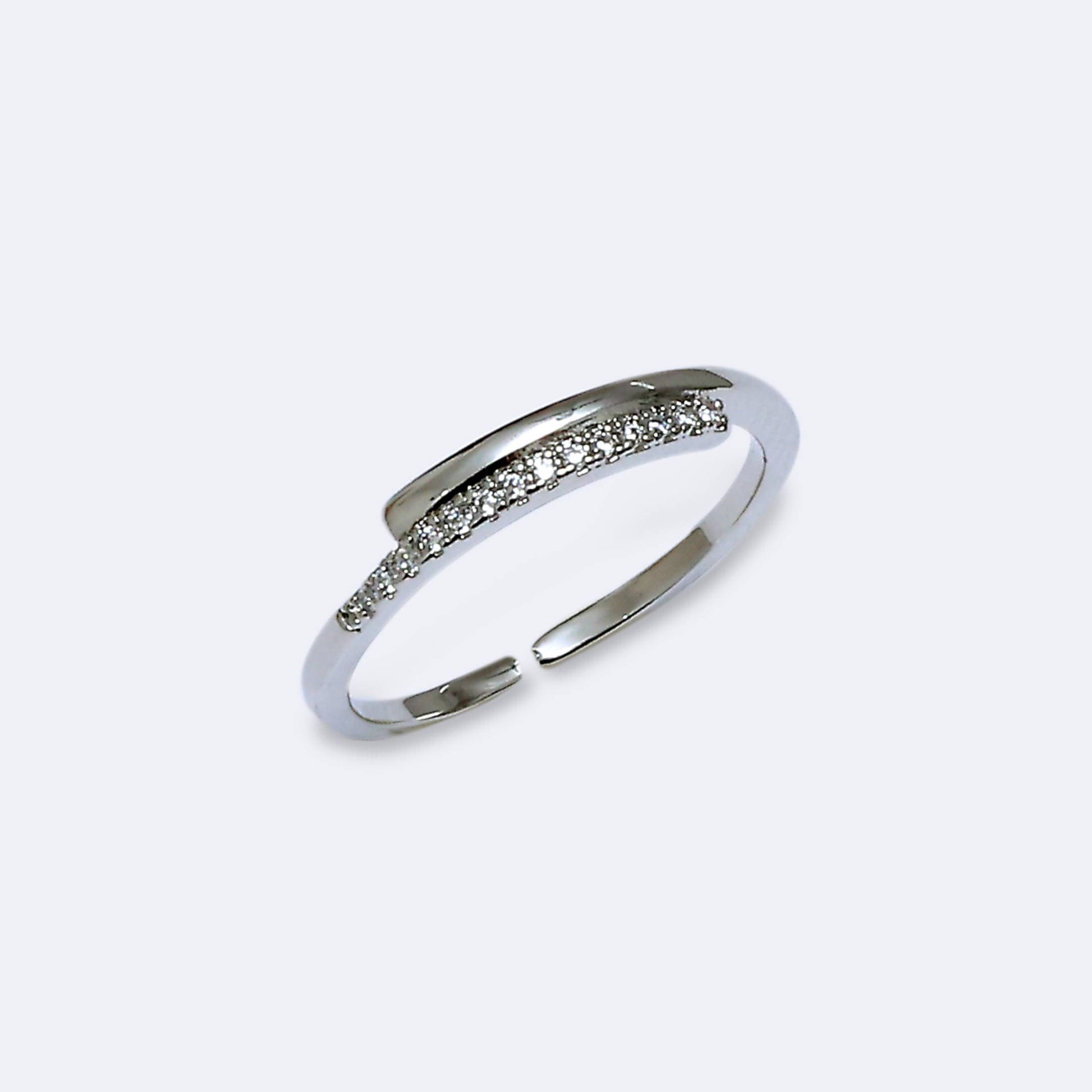 Glimii adjustable O statement ring with silver band and sparkling stones on white background