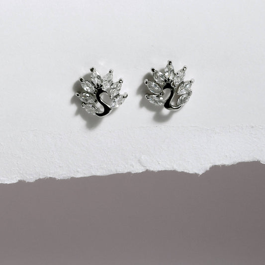 Glimii Korean style stud earrings with silver peacock design and clear crystal accents