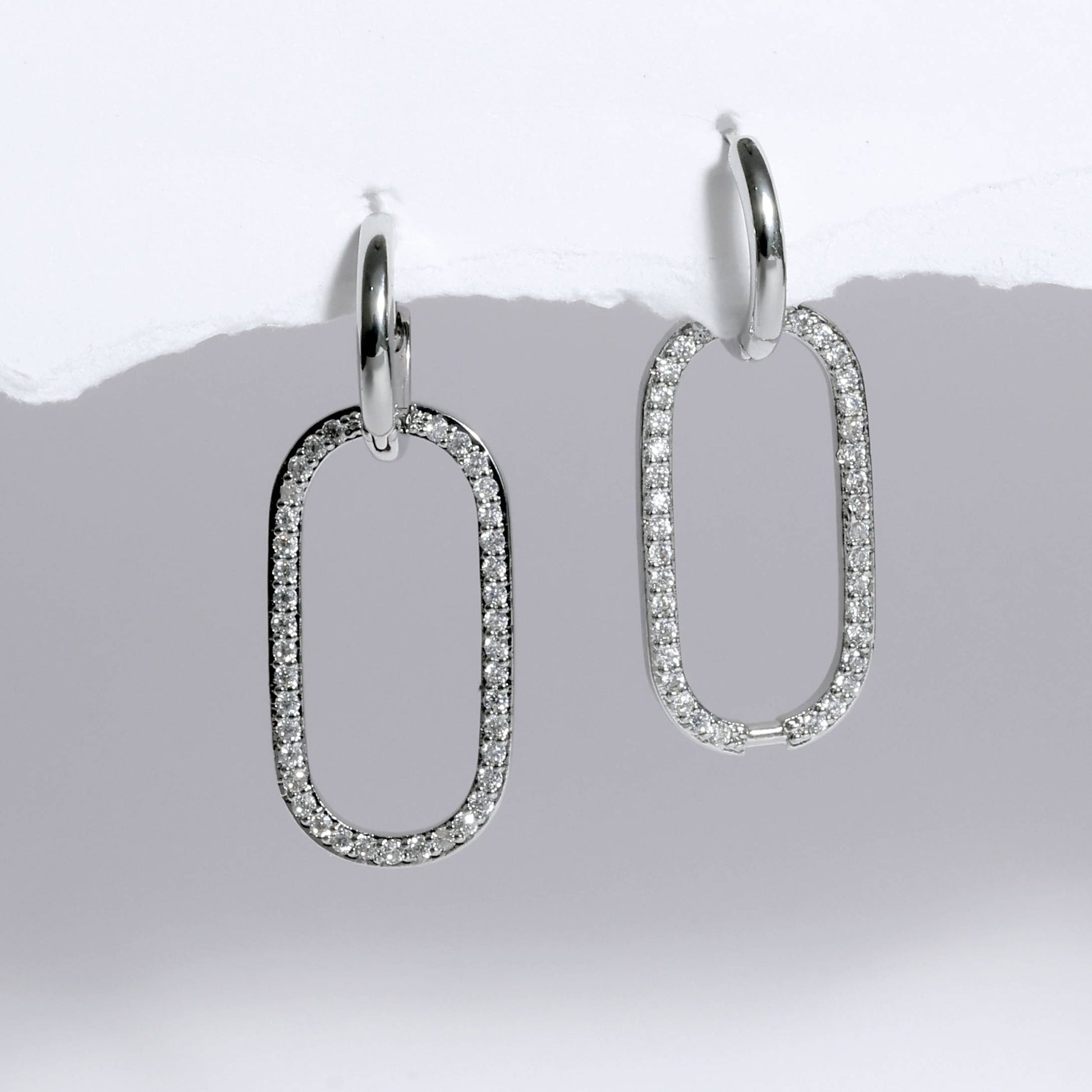 Glimii silver minimalist statement earrings with oval-shaped diamond-encrusted dangling loops