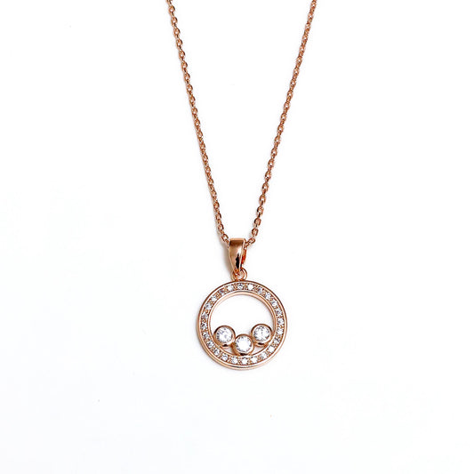 Glimii rose gold stainless steel dainty necklace with circular pendant and three sparkling crystals