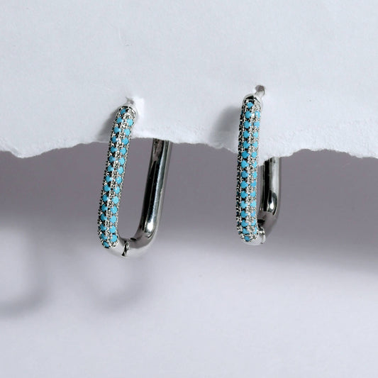 Glimii stainless steel minimalist earrings with blue gemstone accents in hoop design