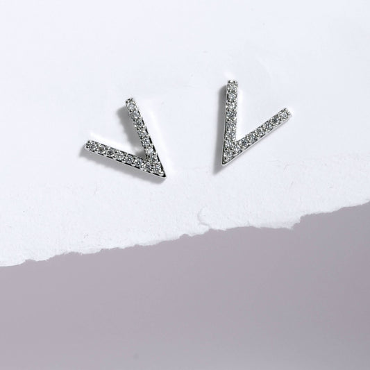 Glimii stainless steel stud earrings shaped like small V with embedded crystals